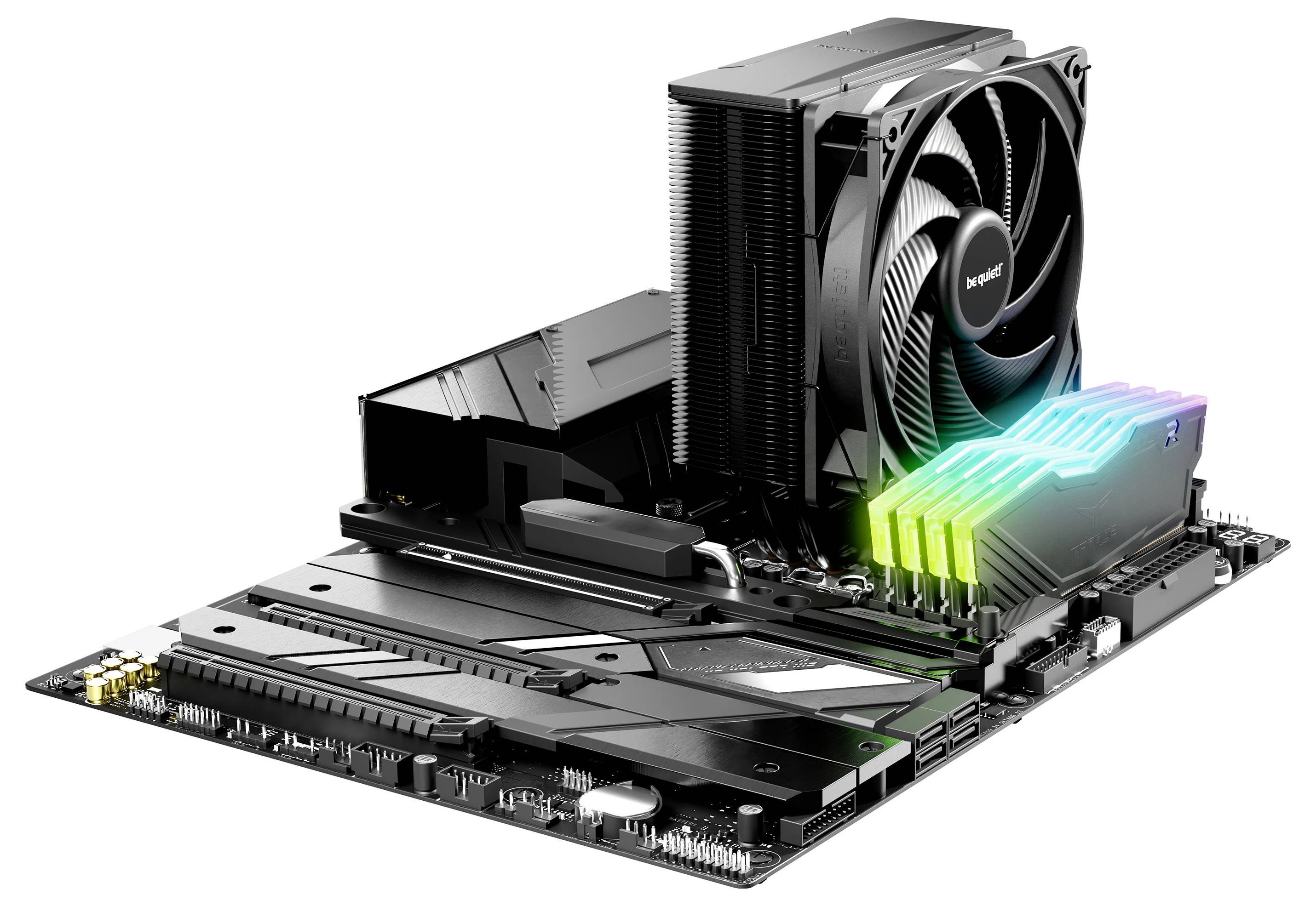 Eine schwarze Computerplatine mit einem großen Kühlkörper und Lüfter. Sie verfügt über leuchtende, mehrfarbige RAM-Speicherriegel und verschiedene Steckplätze für Komponenten.