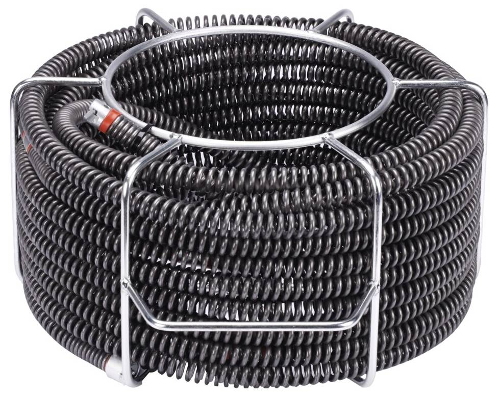 Eine große Spule aus schwarzem Metallkabel mit einem roten Anschluss, eingebettet in einem Drahtgestell.