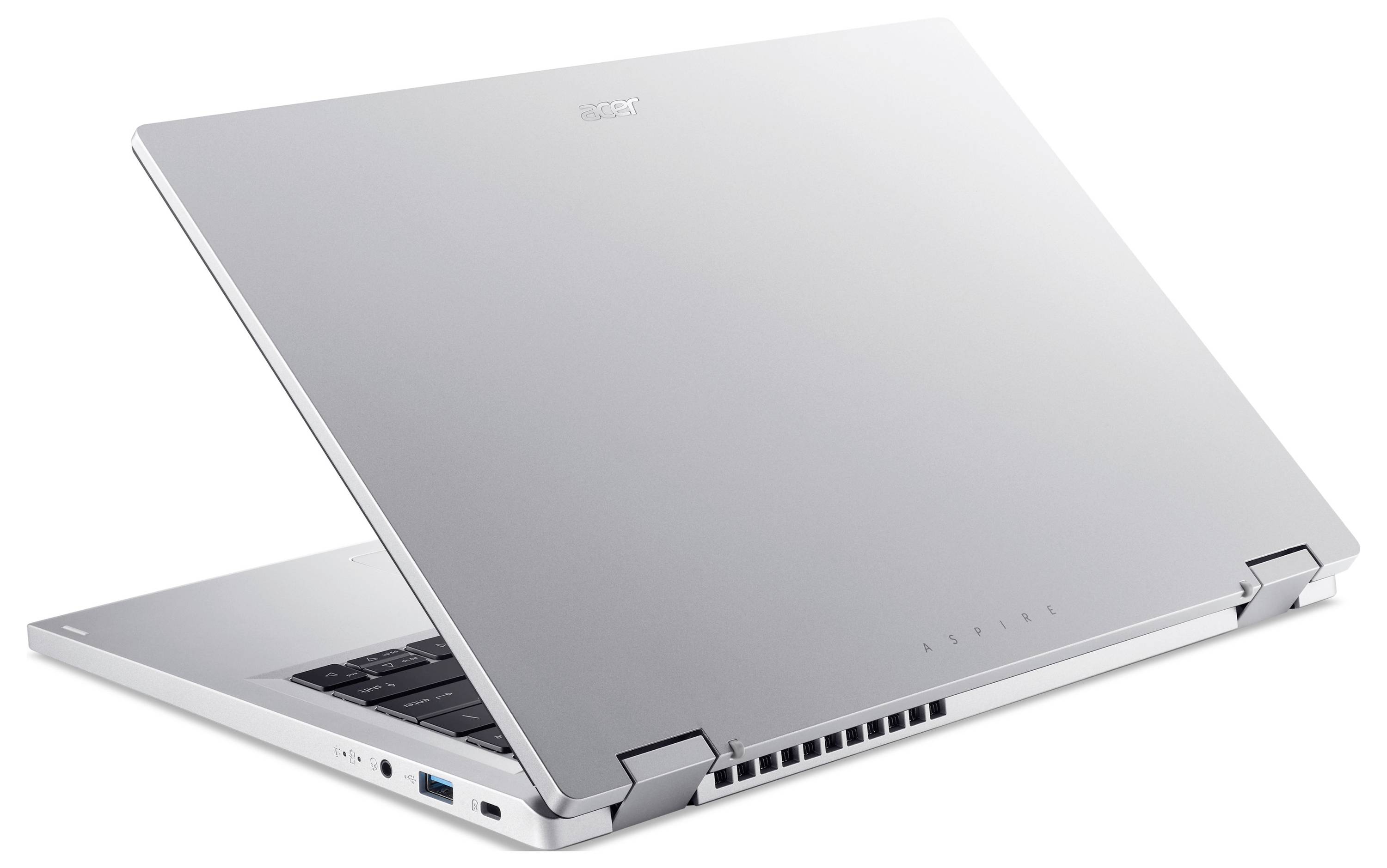 Ein silberner Laptop, teilweise geöffnet, mit einem Blick auf die Tastatur. Der Deckel zeigt ein Markenlogo. Das Design ist schlicht und modern.