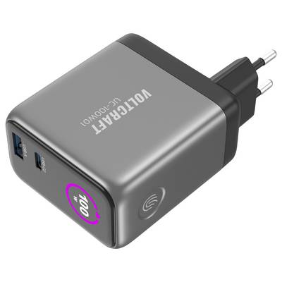 Ein grauer VOLTCRAFT UC-100W-Wandladegerät mit zwei USB-Anschlüssen und klappbaren Steckdosen, auf der Seite mit "100" gekennzeichnet, was die Leistungskapazität angibt.