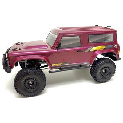 Ein roter ferngesteuerter Geländewagen mit großen Reifen und robustem Design, geeignet für unwegsames Gelände.