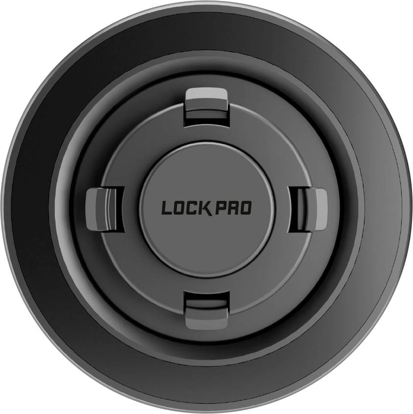 Ein kreisförmiges schwarzes Gerät mit der Bezeichnung „LOCK PRO", von oben betrachtet, mit einer zentralen Taste und einem äußeren gerippten Ring zum Greifen oder Drehen.
