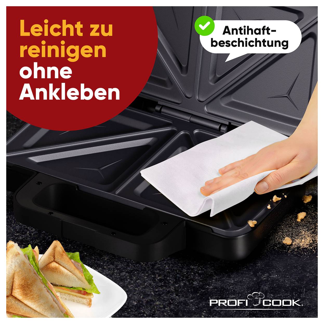 Ein Sandwichmaker wird gezeigt. Eine Hand wischt Krümel mit einem Tuch ab. Text: 'Leicht zu reinigen ohne Ankleben'.