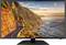 Ein Desktop-Monitor zeigt eine malerische Aussicht auf eine Küstenstraße, die sich entlang einer Klippe windet, mit dem Ozean rechts und einem Sonnenuntergang im Hintergrund.