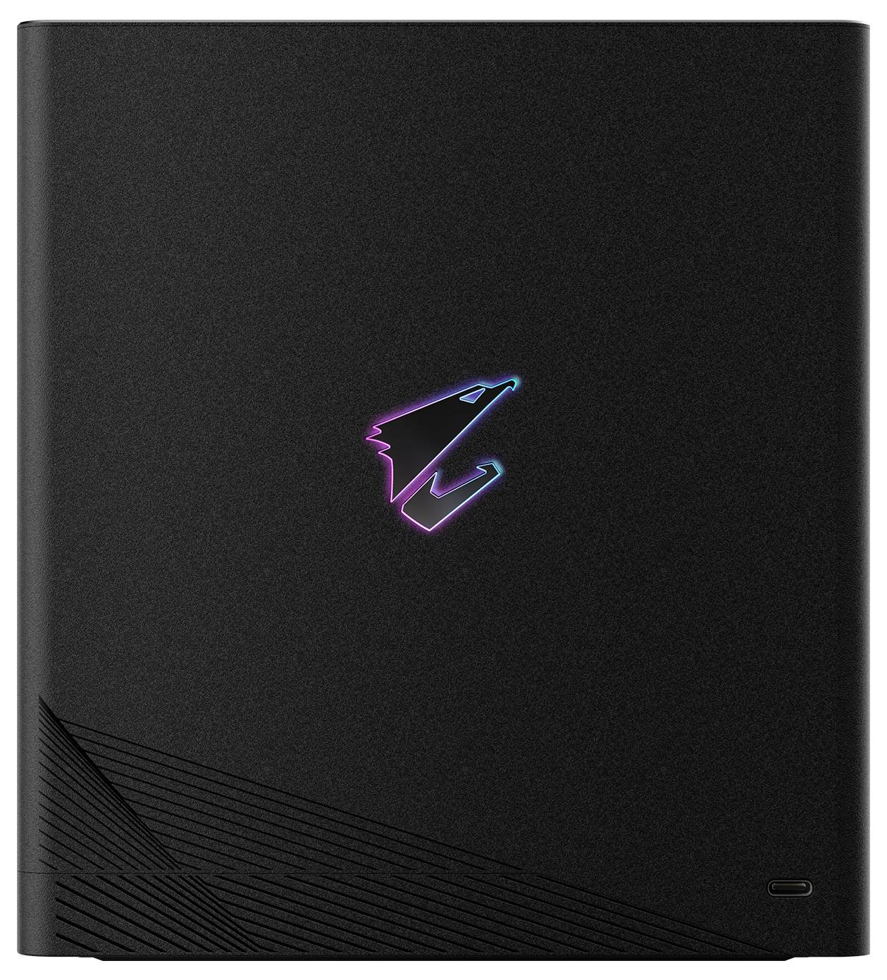 Eine schlanke schwarze externe Festplatte mit einem leuchtenden Logo in der Mitte, versehen mit einem dezenten Linienmuster und einem USB-C-Anschluss am unteren Rand.