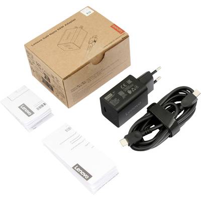 Lenovo USB-C 65W AC-Adapter mit angeschlossenem Kabel, Verpackungskarton und Produktinformationsbroschüren.