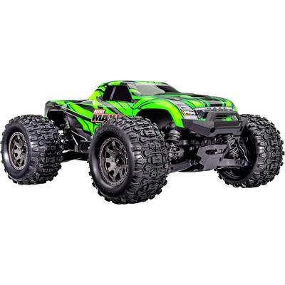 Ein grüner und schwarzer ferngesteuerter Monstertruck mit großen, robusten Reifen, der vor einem weißen Hintergrund präsentiert wird.