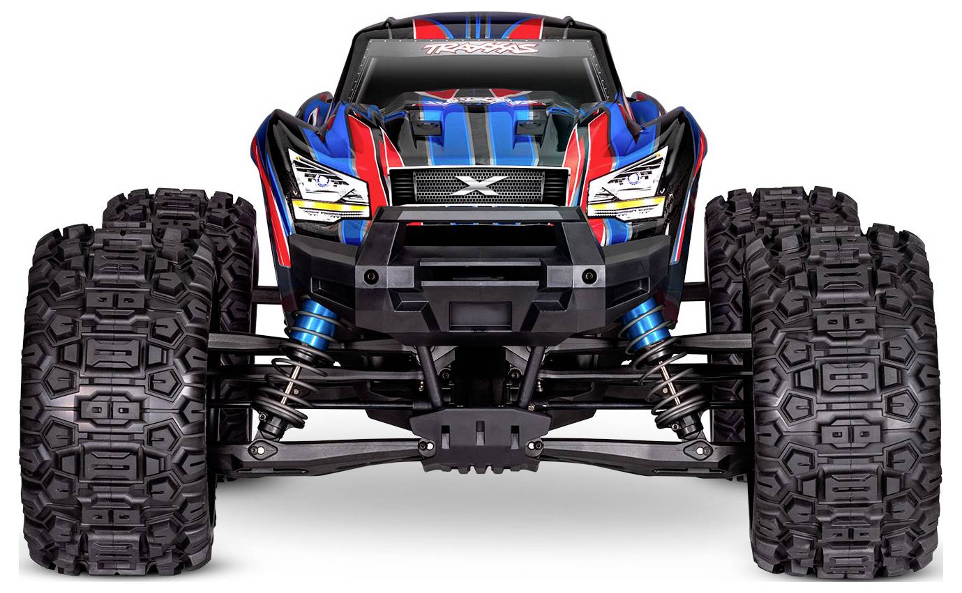 Ein knallbunt lackierter ferngesteuerter Monstertruck mit großen, robusten Reifen und einem schlanken, dynamischen Design, von vorne betrachtet.
