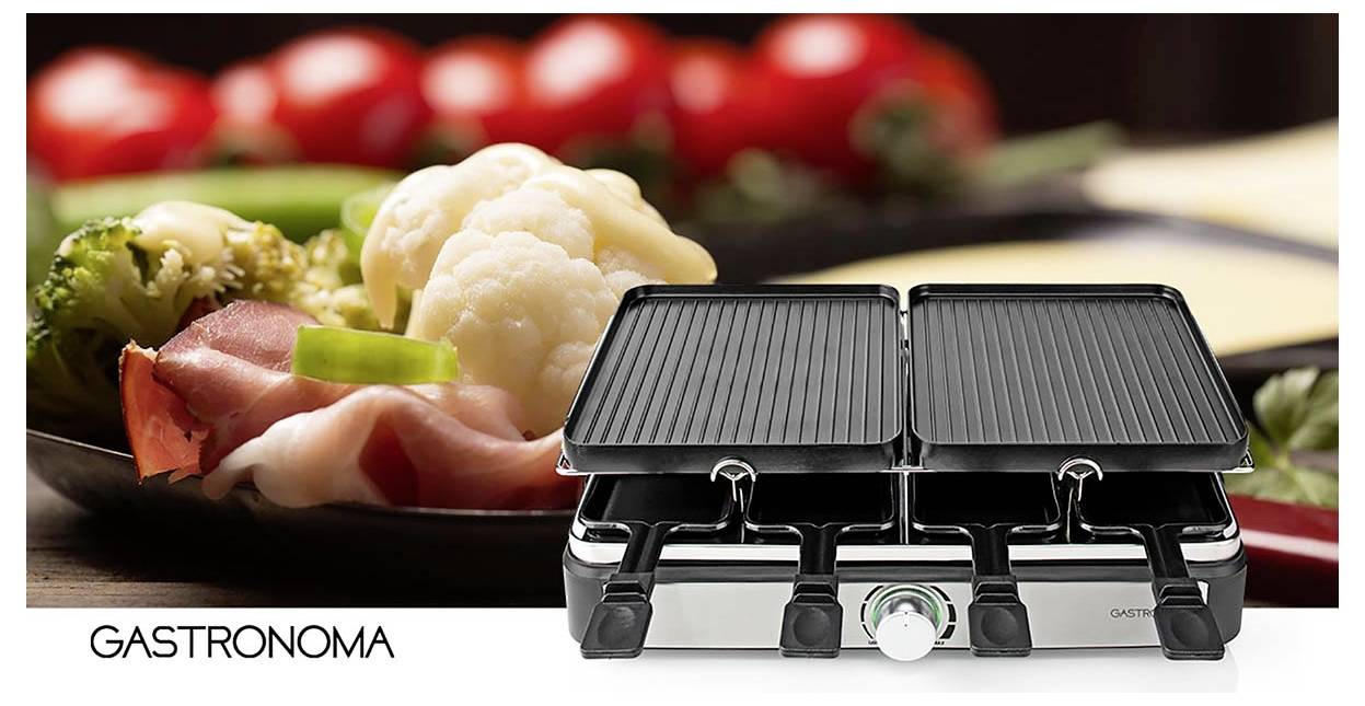 Ein Raclette-Grill im Vordergrund, umgeben von frischen Gemüsesorten und Scheiben von Schinken im Hintergrund. Der Markenname 'Gastronoma' erscheint an der Seite.