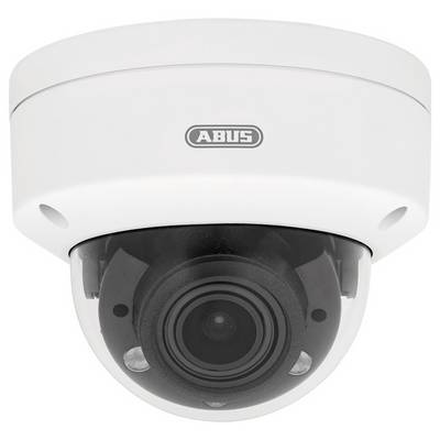 Eine weiße Kuppelsicherheitskamera mit einer durchsichtigen Abdeckung, die die Linse zeigt, montiert auf einer grauen Oberfläche.