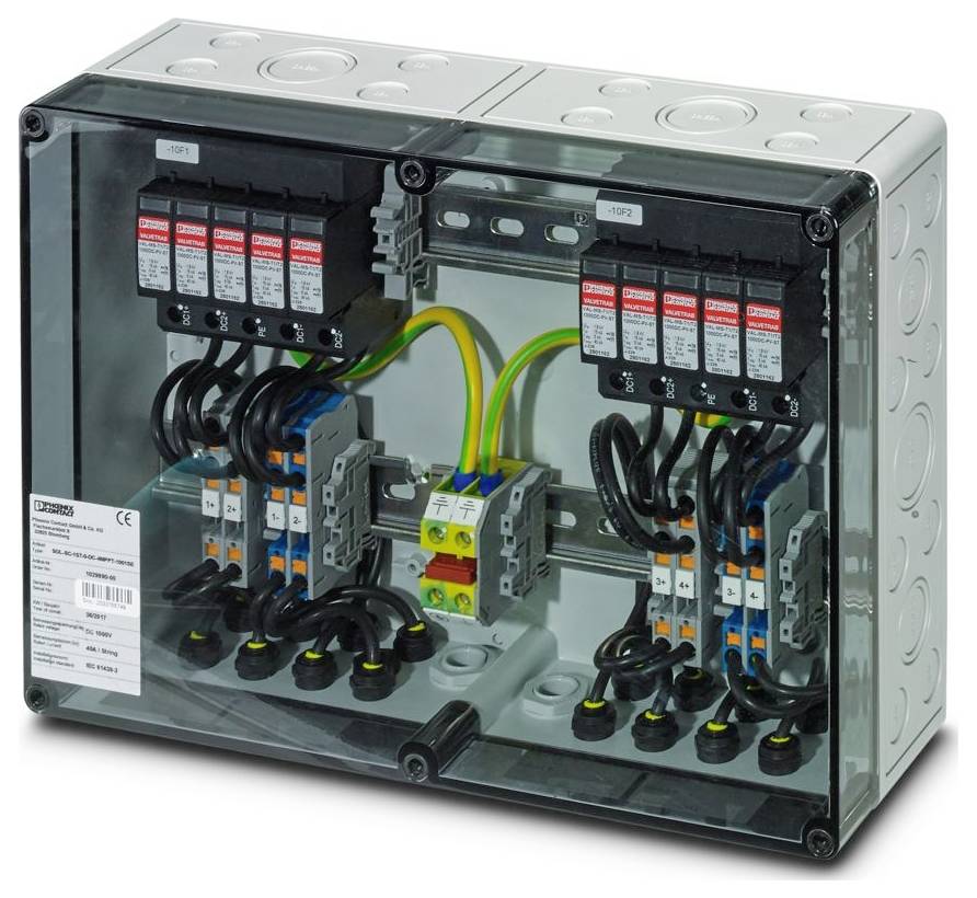 Ein türkisfarbenes Kunststoffgehäuse mit transparenter Abdeckung, bestehend aus Metallsteckern an der Basis. Wird für elektrische oder mechanische Funktionen verwendet.