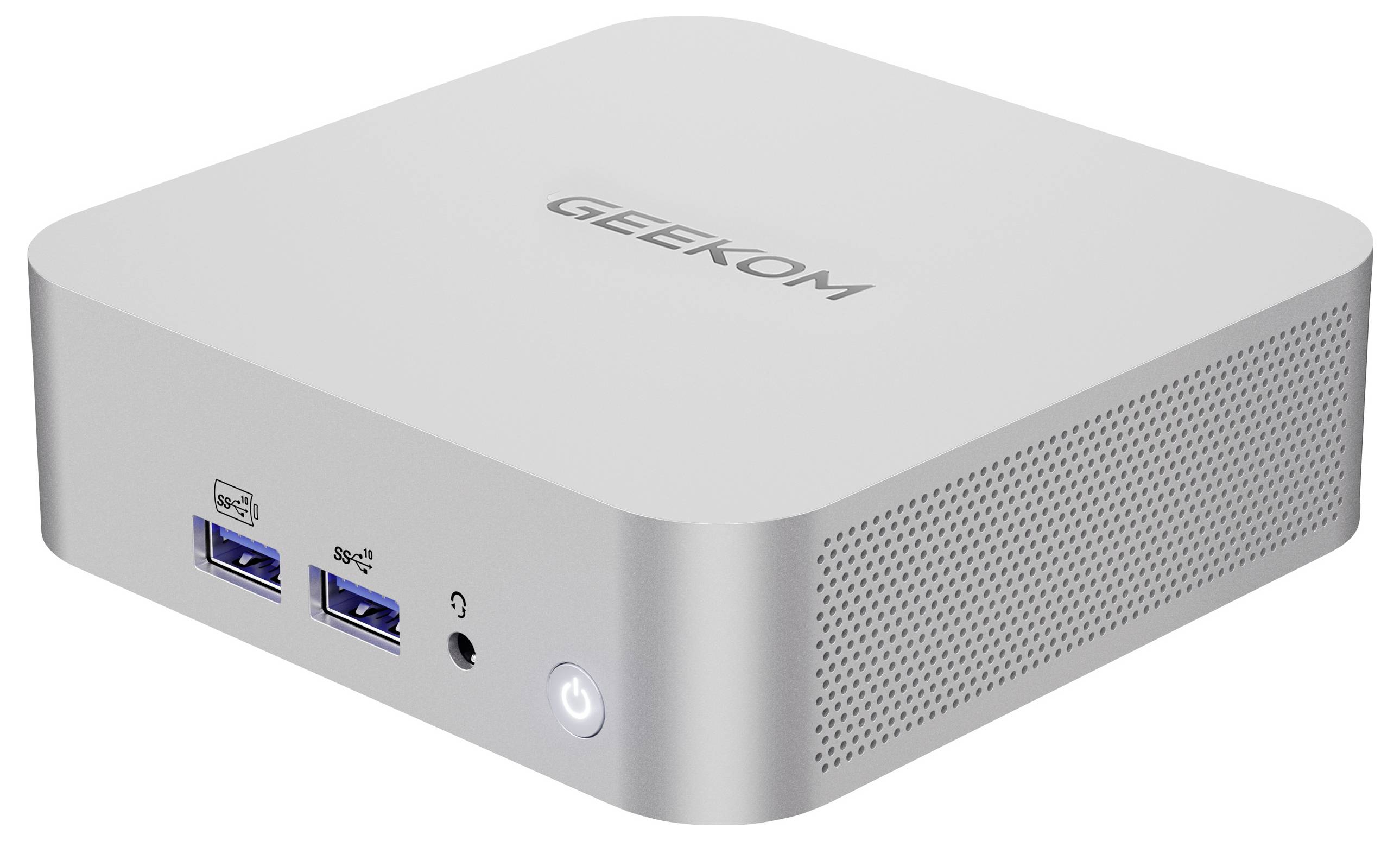 Ein kleiner, kompakter silberner Computer mit der Aufschrift „GEEKOM" auf der Oberseite, ausgestattet mit zwei USB-Anschlüssen, einer Kopfhörerbuchse und einem runden Netzschalter auf der Vorderseite.