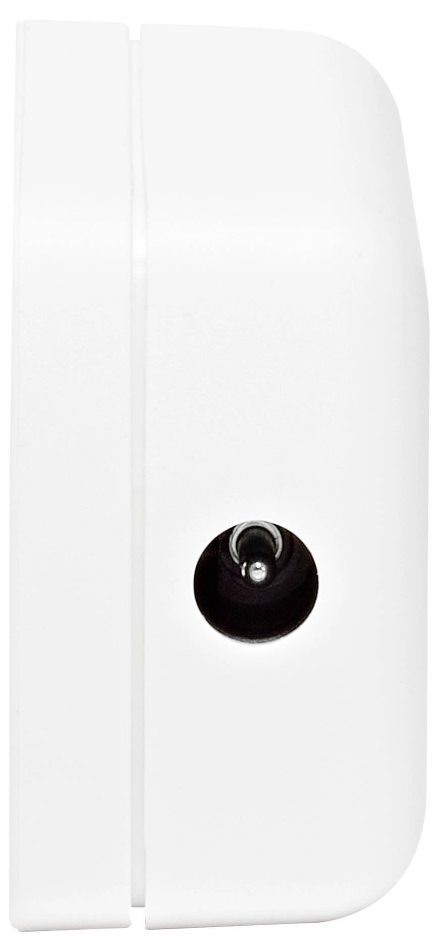 Eine Nahaufnahme eines weißen wandmontiertes Gerät, möglicherweise ein Sensor oder Knopf, mit einer kleinen kreisrunden dunklen Linse oder Taste an seiner Seite.