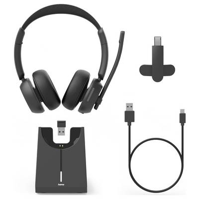 Drahtloses Headset mit Mikrofon, USB-C-Adapter, Ladestation und USB-Kabel, auf weißem Hintergrund ausgelegt.