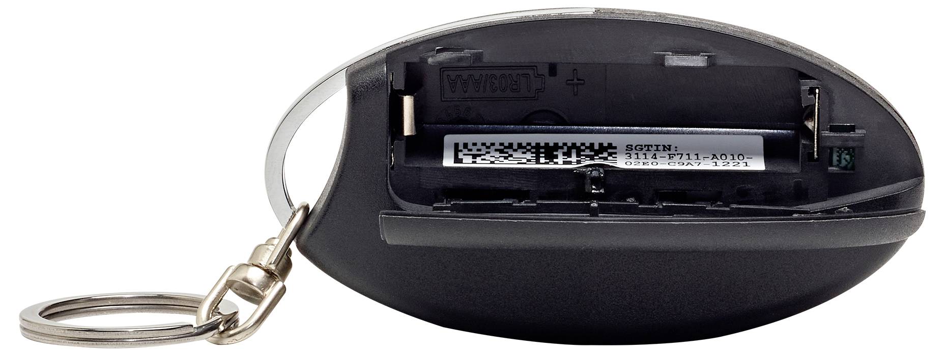 Ein Schlüsselanhänger, bei dem die Rückabdeckung entfernt wurde und dadurch das Batteriefach sowie ein kreisförmiger Schlüsselring an der Seite sichtbar sind.