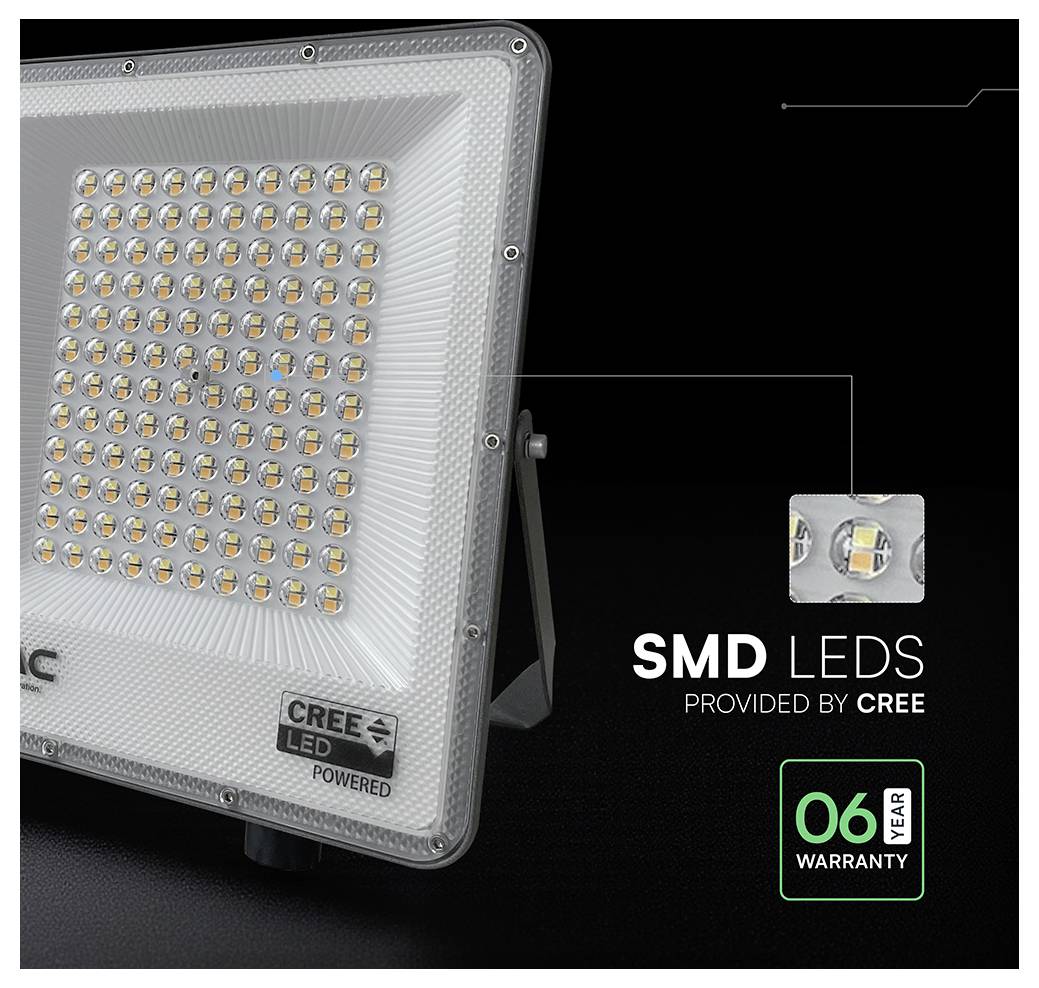 Ein LED-Flutlichtstrahler mit der Bezeichnung „V-TAC Premium Quality Aluminium" mit Standfuß. Der Text zeigt an: „1 Meter Kabel", „Flimmerfrei" und „Keine UV-Strahlung".