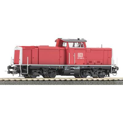 Eine rote Diesellokomotive mit der Aufschrift „DB 213 348-3" an der Seite, dargestellt auf einer Modelleisenbahnstrecke. Der Zug hat ein kompaktes Design und eine charakteristische rote Farbe.