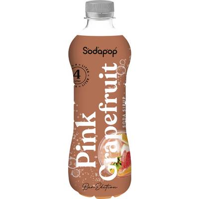 Eine Flasche Sodapop Marken Grapefruit-Sirup, auf dem Etikett '4 Liter', mit einem Bild eines Grapefruit-Segments auf der Vorderseite.