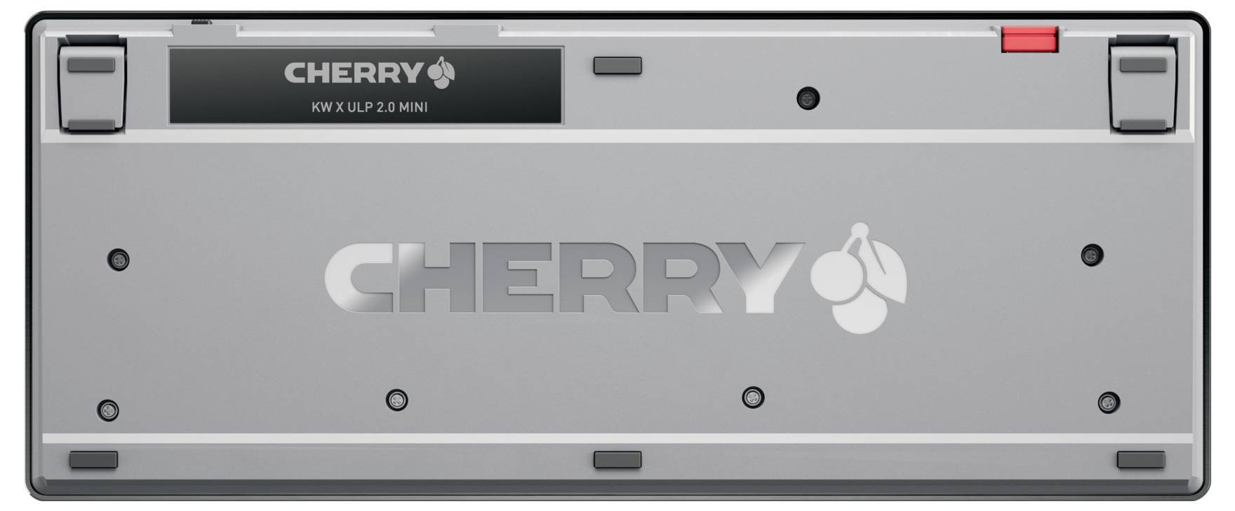 Eine Ansicht der Unterseite einer CHERRY-Tastatur, Modell KW X ULP 2.0. Das Design umfasst verstellbare Füße und eine rote Taste auf einer Seite.