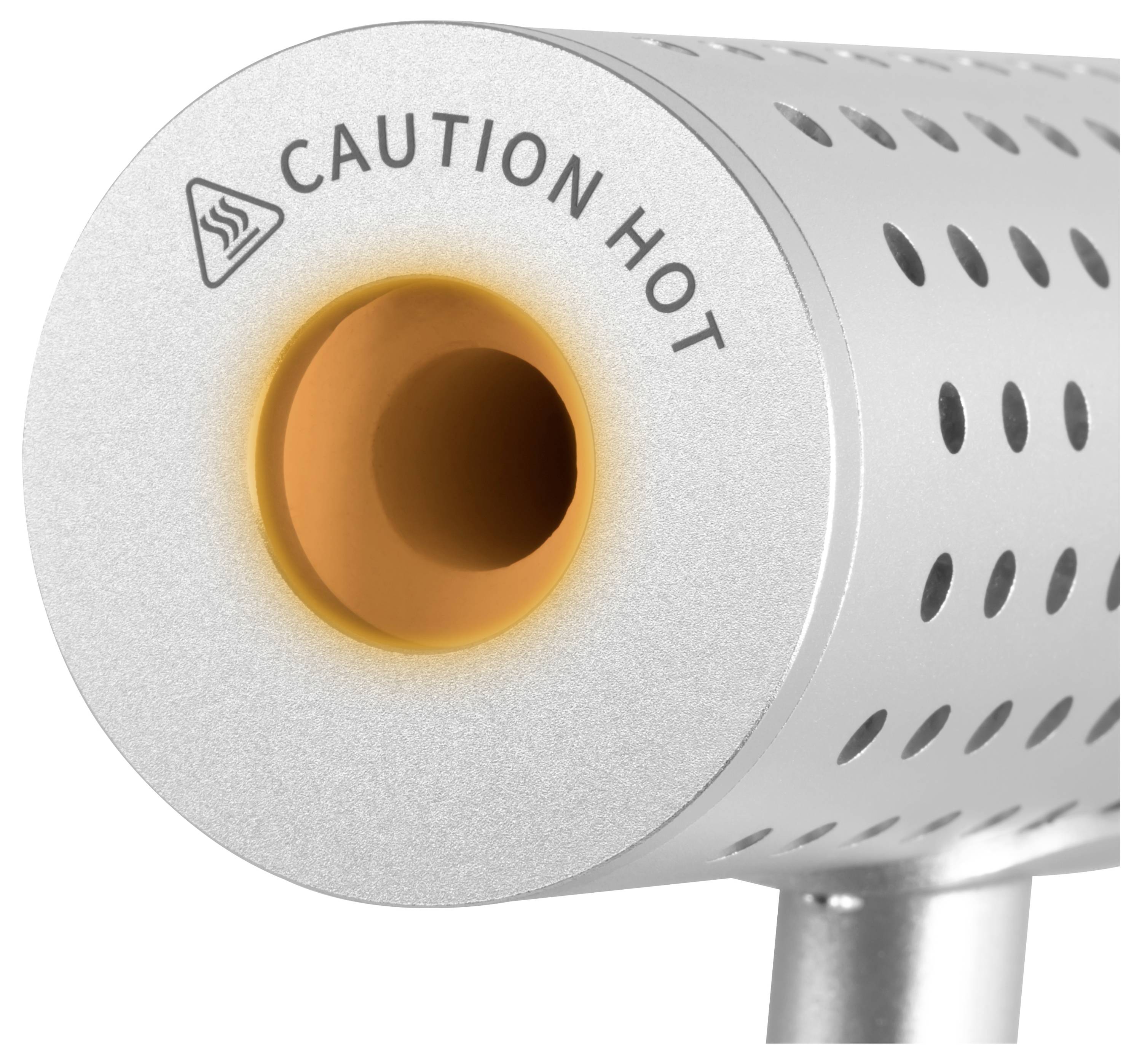 Nahaufnahme einer Metallapparatdüse mit der Aufschrift "CAUTION HOT" und einer glühend orangefarbenen Öffnung, die Hitze oder Abgase anzeigt.