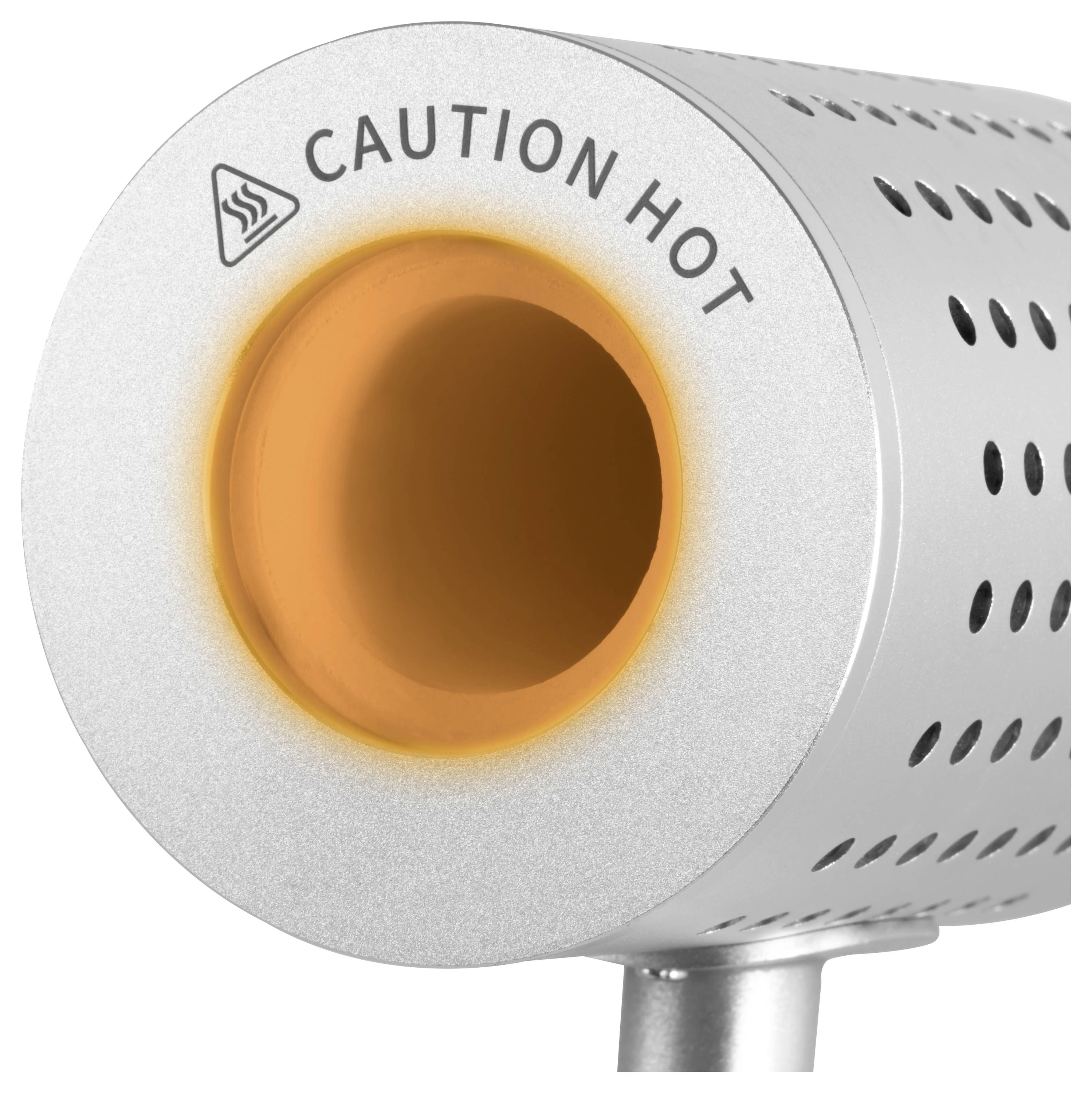 Nahaufnahme eines metallischen Geräts mit einer orange leuchtenden Öffnung mit der Bezeichnung „CAUTION HOT" (Vorsicht heiß), die auf ein beheiztes Gerät oder Heizgerät hinweist.