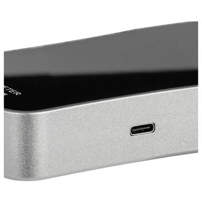 Nahaufnahme eines silbernen elektronischen Geräts mit einem USB-C-Ladeanschluss an der Vorderkante.