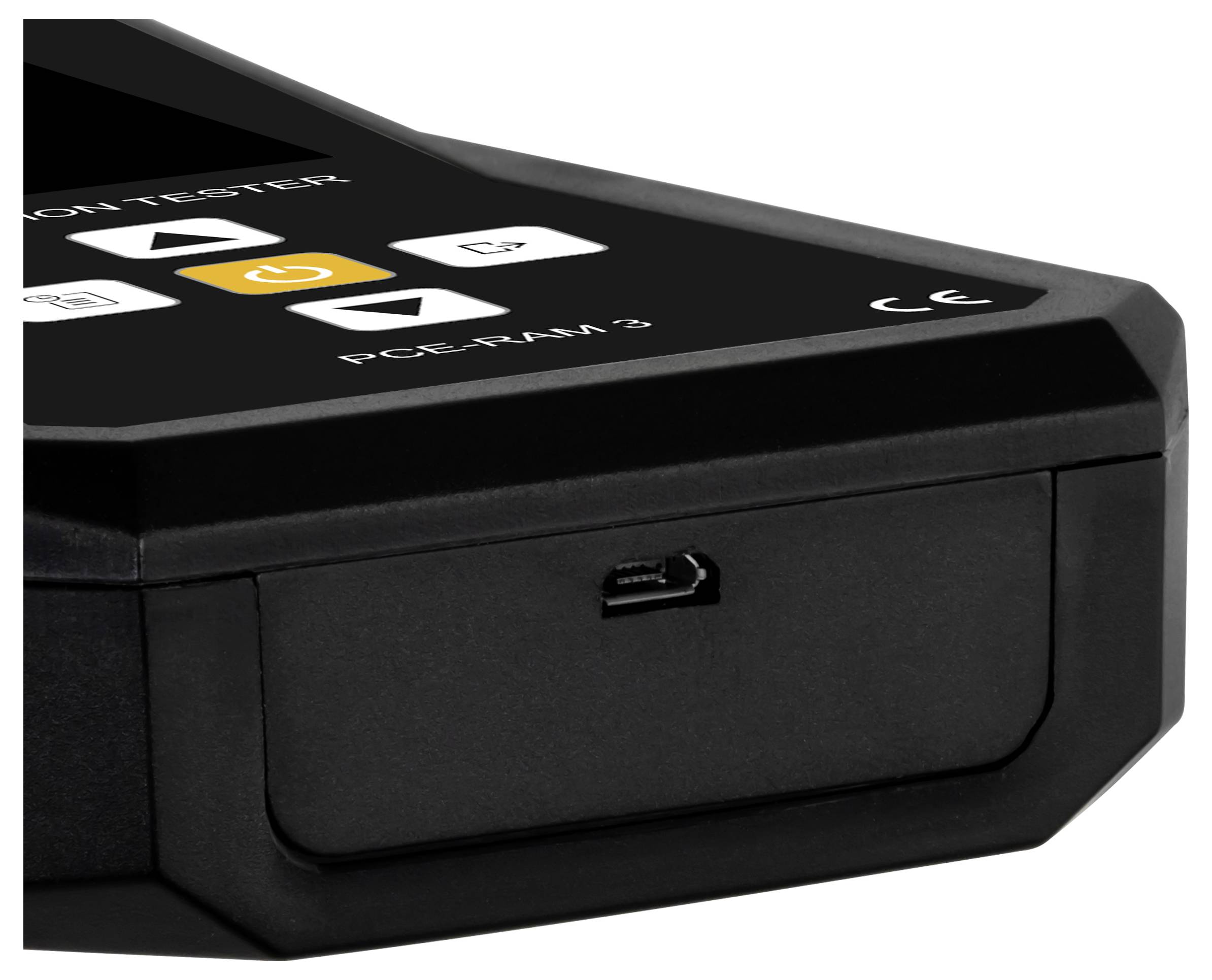 Nahaufnahme eines schwarzen tragbaren Bewegungstestgeräts mit Steuertasten, einem USB-Anschluss und der Bezeichnung „PCM-XM 2".