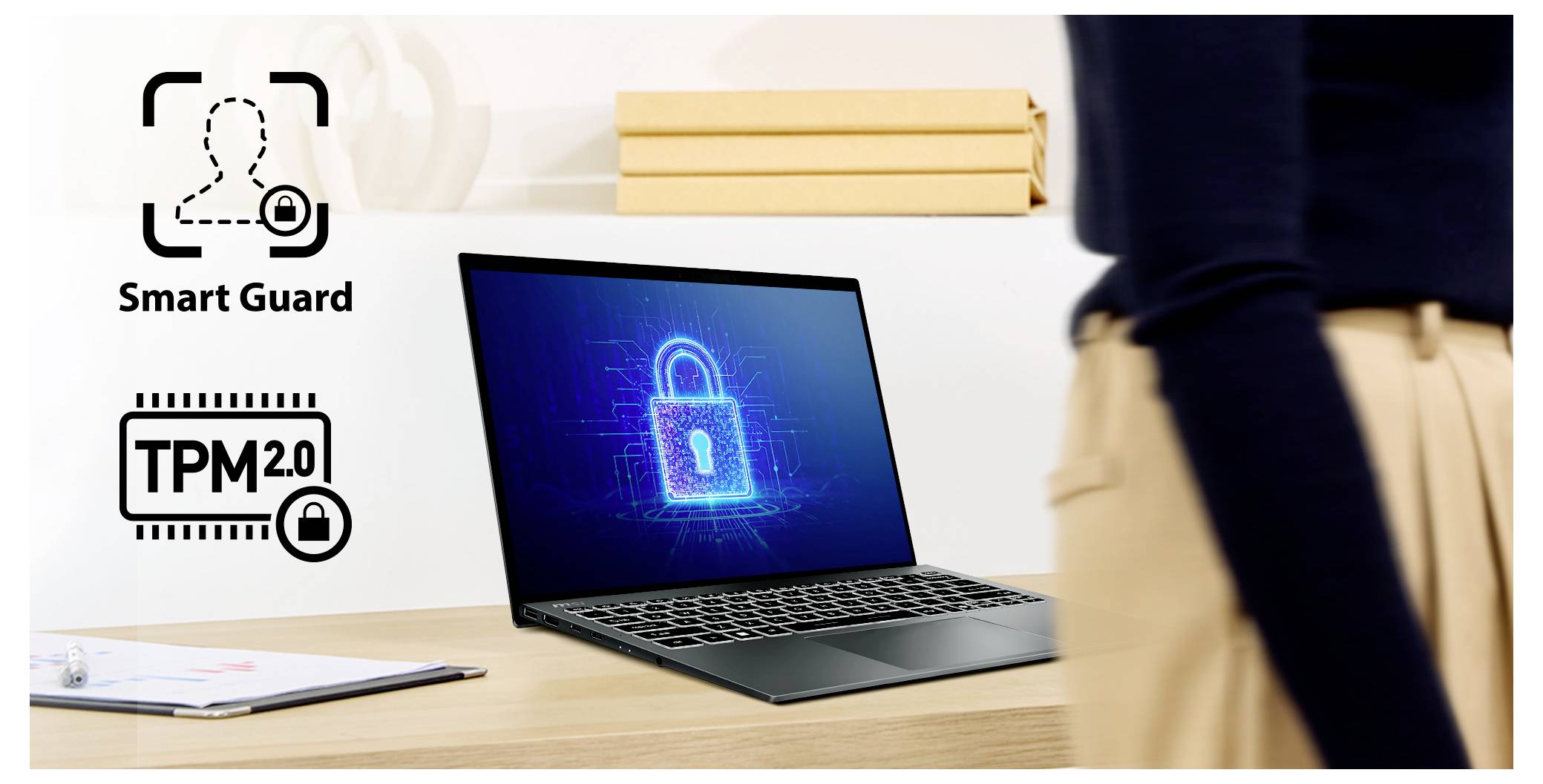 „Smart Guard" und „TPM 2.0" Symbole neben einem Laptop, auf dessen Bildschirm ein Schlosssymbol angezeigt wird, was auf erhöhte Sicherheit hindeutet. Eine unscharfe Figur befindet sich im Vordergrund.