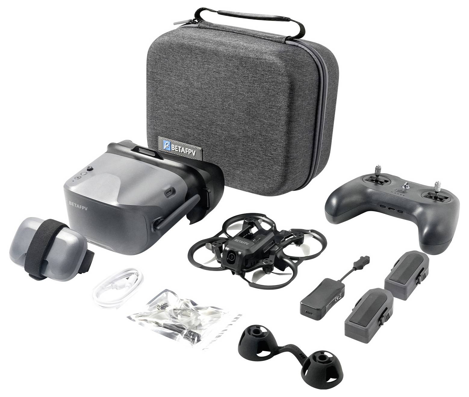 Betafpv FPV-Drohnen-Kit-Komponenten ausgelegt, einschließlich eines Hartschalenkoffer, Flugbrille, Drohne, Fernsteuerung, Batterien, Ladegerät, Kabel und Ersatzteile.