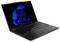 Schwarzer Laptop mit blauem Bildschirm und sichtbarer Tastatur, auf dem das Windows-Betriebssystem angezeigt wird, mit einem offenen Startmenü, das App-Symbole zeigt.