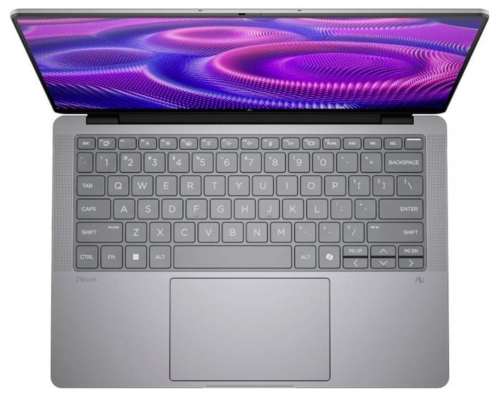 Ein silberner Laptop von oben betrachtet, mit standardmäßigem Tastaturlayout und großem Trackpad. Der Bildschirm zeigt lebendige violette Muster.