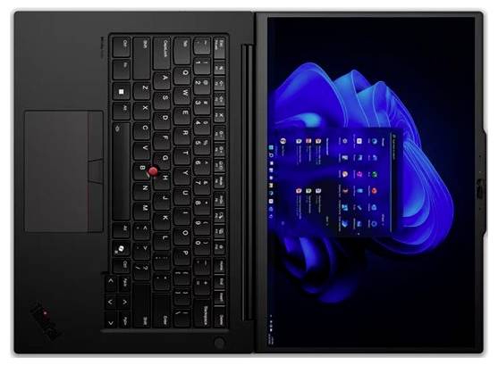 Ein Laptop mit einer schwarzen Tastatur und einem Trackpad auf der linken Seite. Der Bildschirm auf der rechten Seite zeigt eine blau gestaltete Desktop-Oberfläche mit offenem Menü.