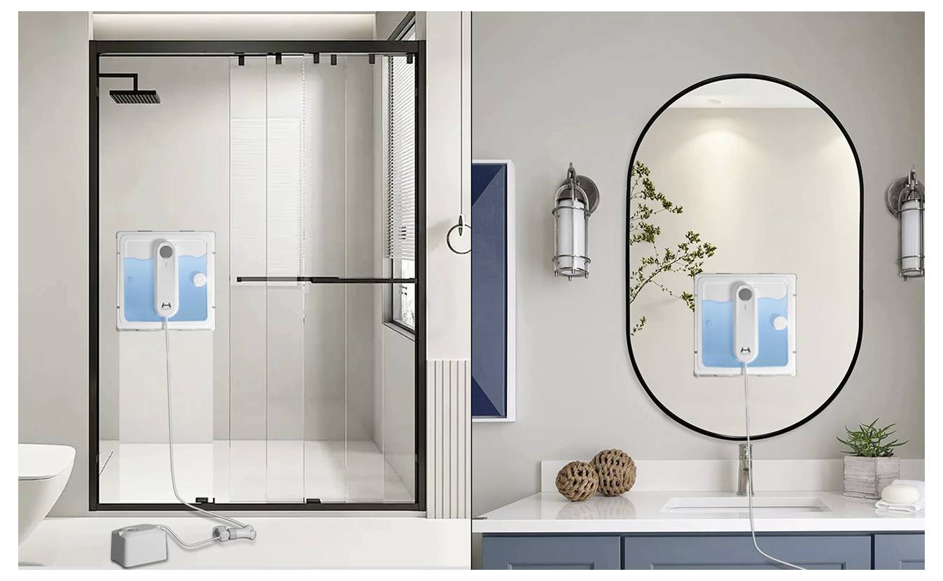 Badezimmer mit einer Dusche und einem Waschbecken. Ein Duschpanel ist im Duschbereich installiert, und eine Zubehörbox befindet sich auf der Waschtischplatte.