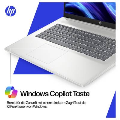 Ein silberner Laptop mit sichtbarem Tastaturdesign. Der Text lautet: „Windows Copilot-Taste. Bereit für die Zukunft mit direktem Zugriff auf die KI-Funktionen von Windows."
