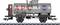Ein Modelleisenbahn-Kesselwagen mit den Logos "APC" und "American Petroleum Co", silbernem Aufbau und schwarzem Fahrgestell auf einem Gleis.