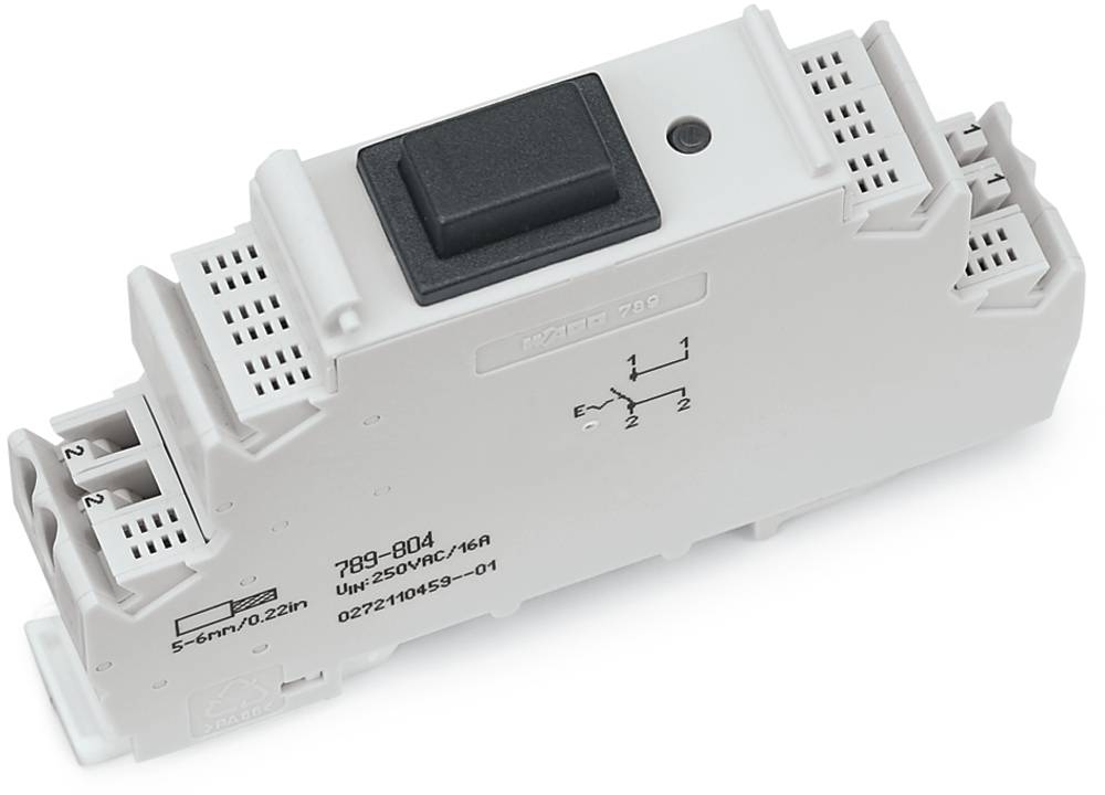 Ein kleines, rechteckiges elektronisches Gerät mit einer zentralen schwarzen Taste und mehreren weißen Anschlussanschlüssen auf jeder Seite, beschriftet mit technischen Spezifikationen, das in Schaltungsanwendungen verwendet wird.
