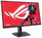 Ein Gaming-Monitor zeigt eine Roboterfigur auf hellem rotem Hintergrund mit großem Logo. Der Text auf dem Bildschirm lautet „Für die, die es wagen".