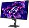 ASUS ROG Gaming-Monitor mit lebendigem rosa- und blauem kosmischem Hintergrund mit ROG-Logo in der Mitte, auf einem schwarzen Ständer montiert.