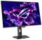 Ein Gaming-Monitor zeigt einen farbenfrohen, abstrakten Hintergrund mit einem stilisierten "ROG"-Logo in Neonfarben in der Mitte.