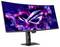 Gekrümmter Gaming-Monitor mit lebhaften blauen und rosa Grafiken auf dem Bildschirm und einem leuchtenden Logo in der Mitte.