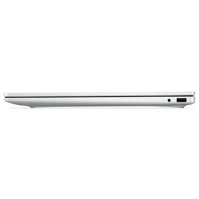 Ein Laptop zeigt einen Videoanruf mit vier lächelnden Personen vor einem blauen Hintergrund an.