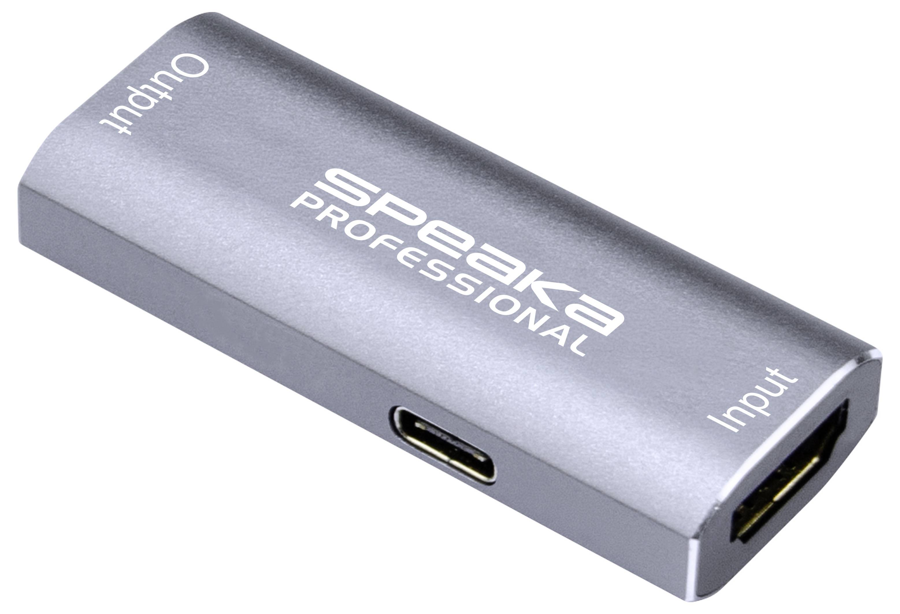 Silver Speaka Professional USB-C Adapter/Dongle mit beschrifteten Ein- und Ausgängen auf weißem Hintergrund.