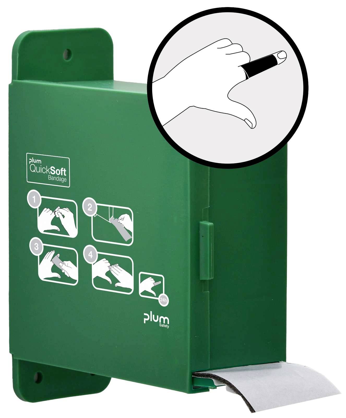 Grüner, wandmontierter Verbandsmittelspender mit Gebrauchsanweisungen. Eine Illustration zeigt eine Hand mit einem Pflaster auf dem Finger.
