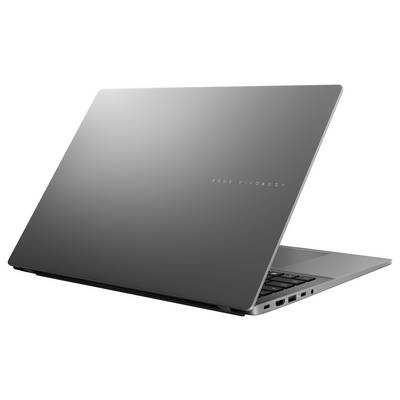 Ein schlanker, grauer Laptop, leicht geöffnet und von hinten betrachtet, zeigt das moderne Design und das schmale Profil mit mehreren Anschlüssen an der Seite.
