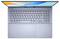Laptop von oben geöffnet, zeigt Tastatur und Trackpad, mit einem farbenfrohen Bildschirm, der abstrakte Formen anzeigt.