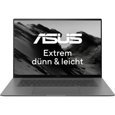 Ein Laptop mit der Aufschrift 'ASUS Extrem dünn & leicht' auf dem Bildschirm, vor einem Hintergrund aus schwarz-weißen Bergen.