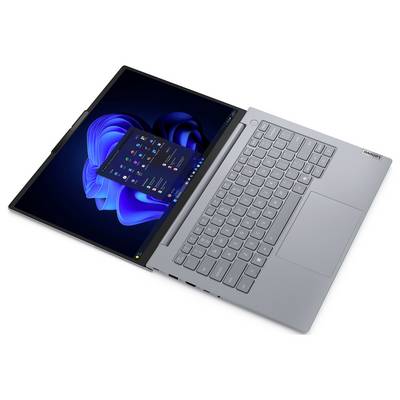 Seitenansicht der linken Kante eines Laptops mit Anschlüssen, einschließlich eines Kartensteckplatzes, eines USB-Anschlusses und einer Audiobuchse.