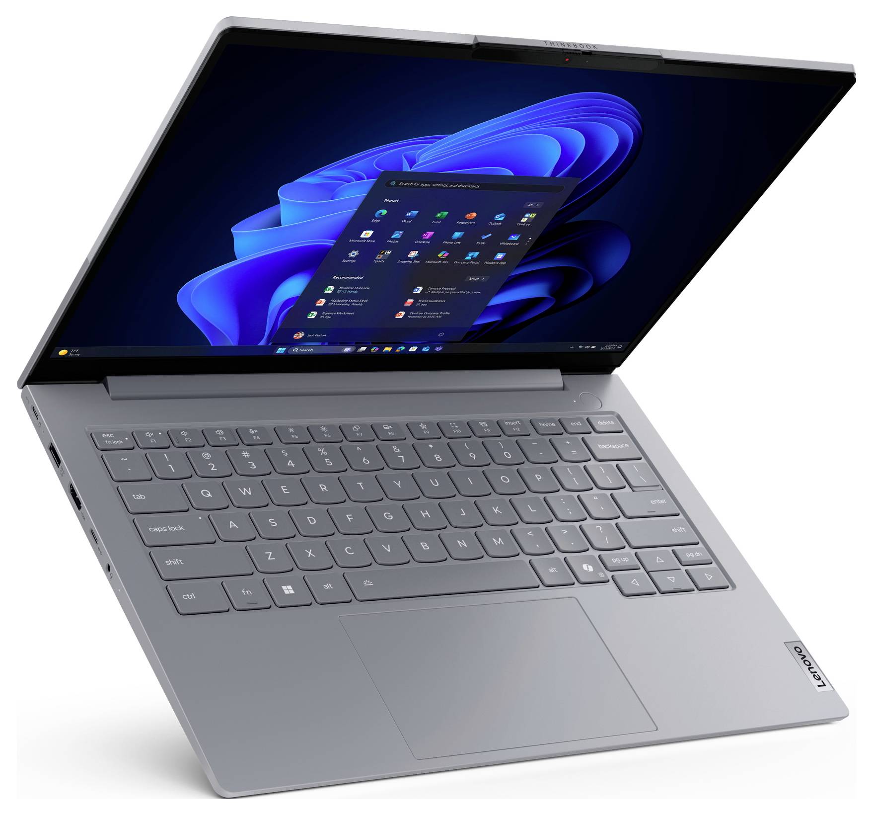 Silberner Lenovo-Laptop in einem Winkel geöffnet, zeigt einen Windows-11-Desktop und ein zentriertes Startmenü auf dem Bildschirm.