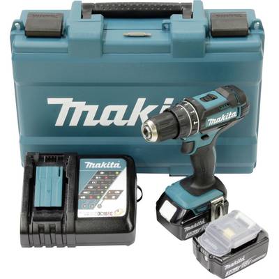 Ein kabelloses Bohrset mit zwei Akkus, einem Ladegerät und einem Makita-Koffer.