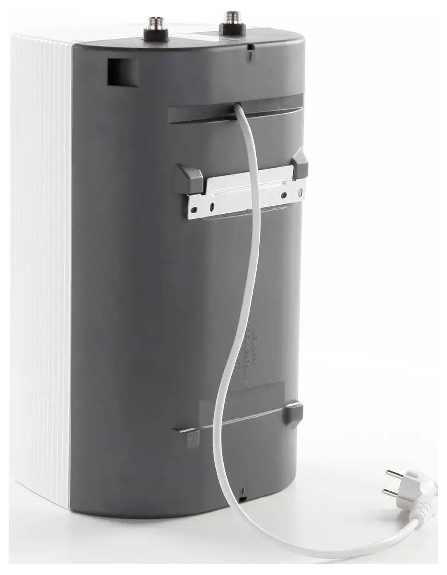 Ein grau-weißes elektronisches Gerät mit einem Stromkabel und Stecker, der hinten angeschlossen ist, möglicherweise zur Verwendung im Haus oder Büro.